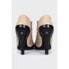 Beige leather open-toe ankle boots