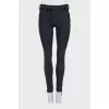 Mid-rise grey skinny jeans