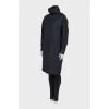Oversized dress with a high collar