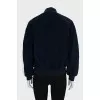 Blue bomber jacket with a zipper