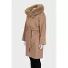 Wool coat with a fur hood