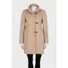 Short wool coat with a high collar