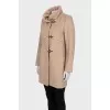 Short wool coat with a high collar