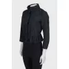 Cropped black jacket with ruffles