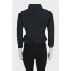 Cropped black jacket with ruffles
