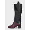 Leather boots in a combination of colors with heels