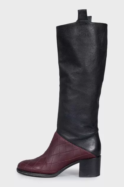 Leather boots in a combination of colors with heels