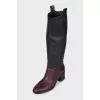 Leather boots in a combination of colors with heels