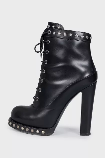 Leather ankle boots with silver decor