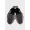 Leather ankle boots with silver decor