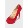 Suede shoes with high soles and heels