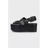 Black leather sandals with silver hardware