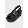 Black leather sandals with silver hardware