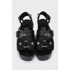 Black leather sandals with silver hardware