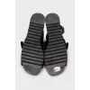 Black leather sandals with silver hardware