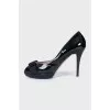 Patent leather heels with a bow