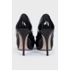 Patent leather heels with a bow