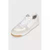 Lace-up sneakers made of leather and suede