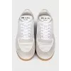 Lace-up sneakers made of leather and suede