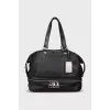 Black leather tote bag with silver hardware