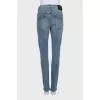 Tapered jeans with signature hardware