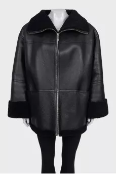 Black long sheepskin coat made of lambskin