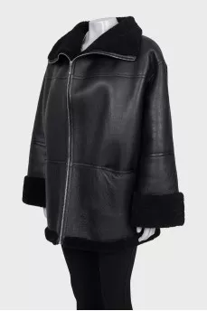 Black long sheepskin coat made of lambskin