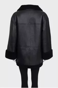 Black long sheepskin coat made of lambskin