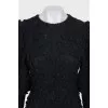 Black dress with voluminous decor