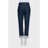 Cropped jeans with white cuffs