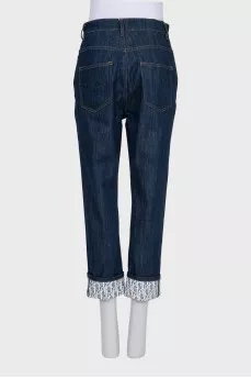 Cropped jeans with white cuffs