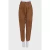 Brown trousers with a belt