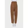 Brown trousers with a belt