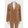 Velvet suit consisting of a jacket and cropped trousers