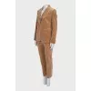 Velvet suit consisting of a jacket and cropped trousers
