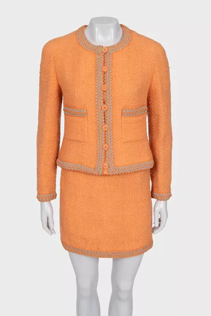 Suit with fitted jacket and miniskirt