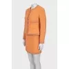 Suit with fitted jacket and miniskirt