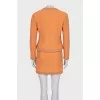 Suit with fitted jacket and miniskirt