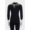 Fitted jumper decorated with beads