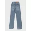 High-waisted straight jeans with buttons