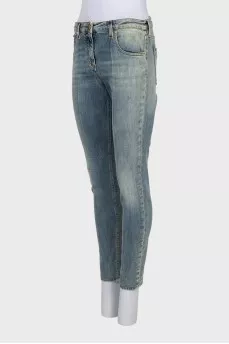 Tapered jeans with a distressed effect