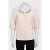 Beige suit with a cardigan and a T-shirt