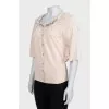 Beige suit with a cardigan and a T-shirt