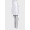 Large pleated skirt with buttons