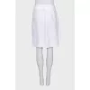 Large pleated skirt with buttons