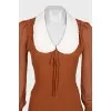Brown dress with a white collar