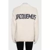Straight-cut jumper with a logo on the back