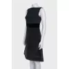 Fitted black dress with a zipper