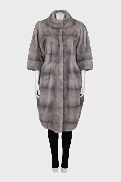 Straight-cut fur coat with a high collar