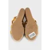 Suede sandals with a woven wedge heel
